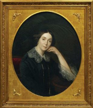 Portrait of an unknown woman in a black dress.