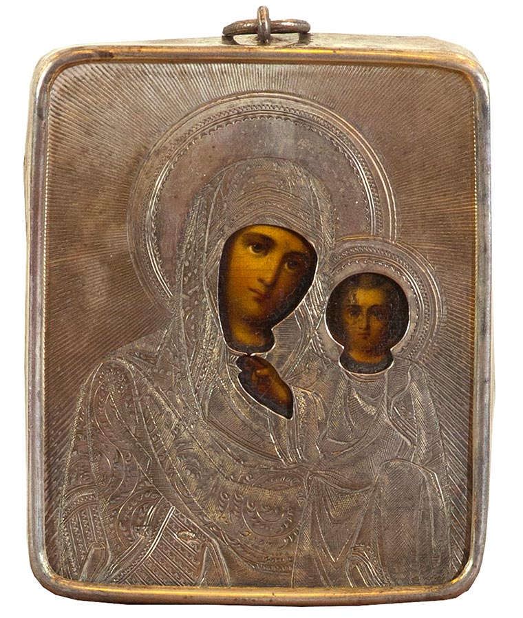 Icon “Our Lady of Kazan” in a silver frame.