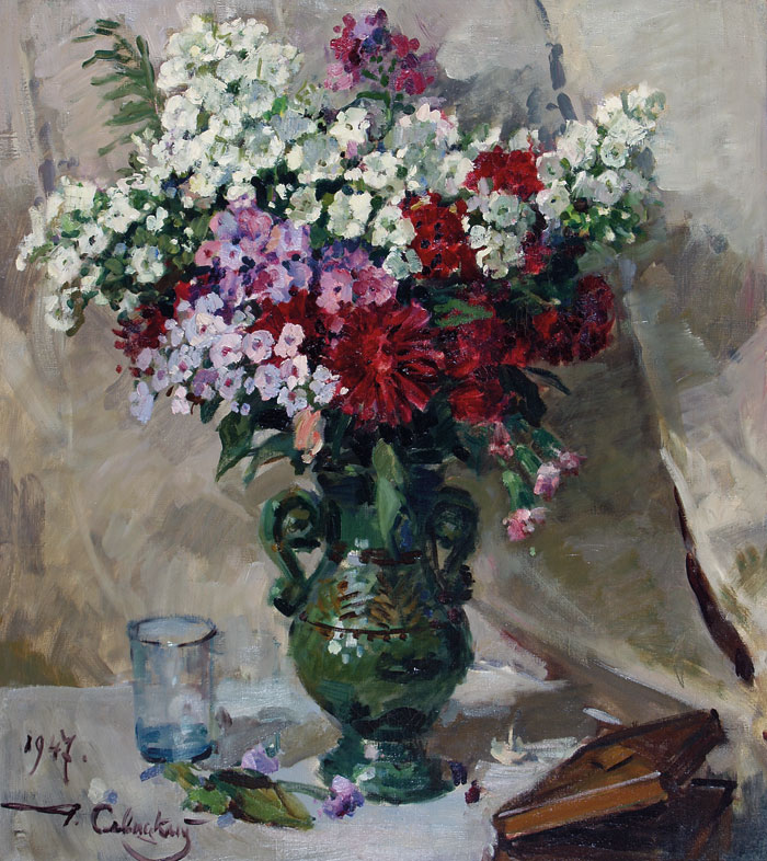Флоксы в зеленой вазе.