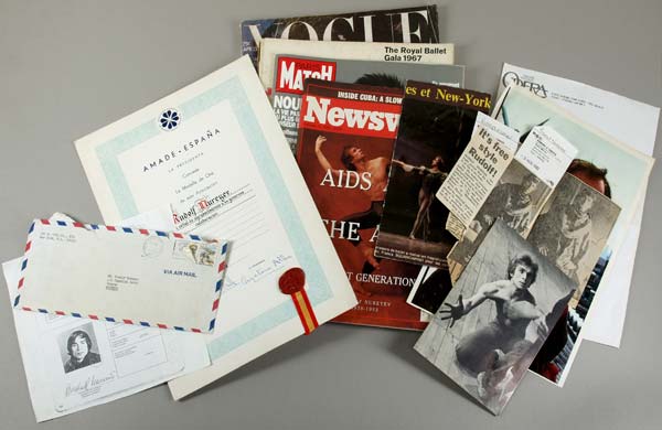 Certificate of the Spanish President, 4 magazines, clippings from magazines and newspapers, icon, invitation, letters, articles, copy of passport, program, postcards, envelope, autograph, album with fan letters and photographs.